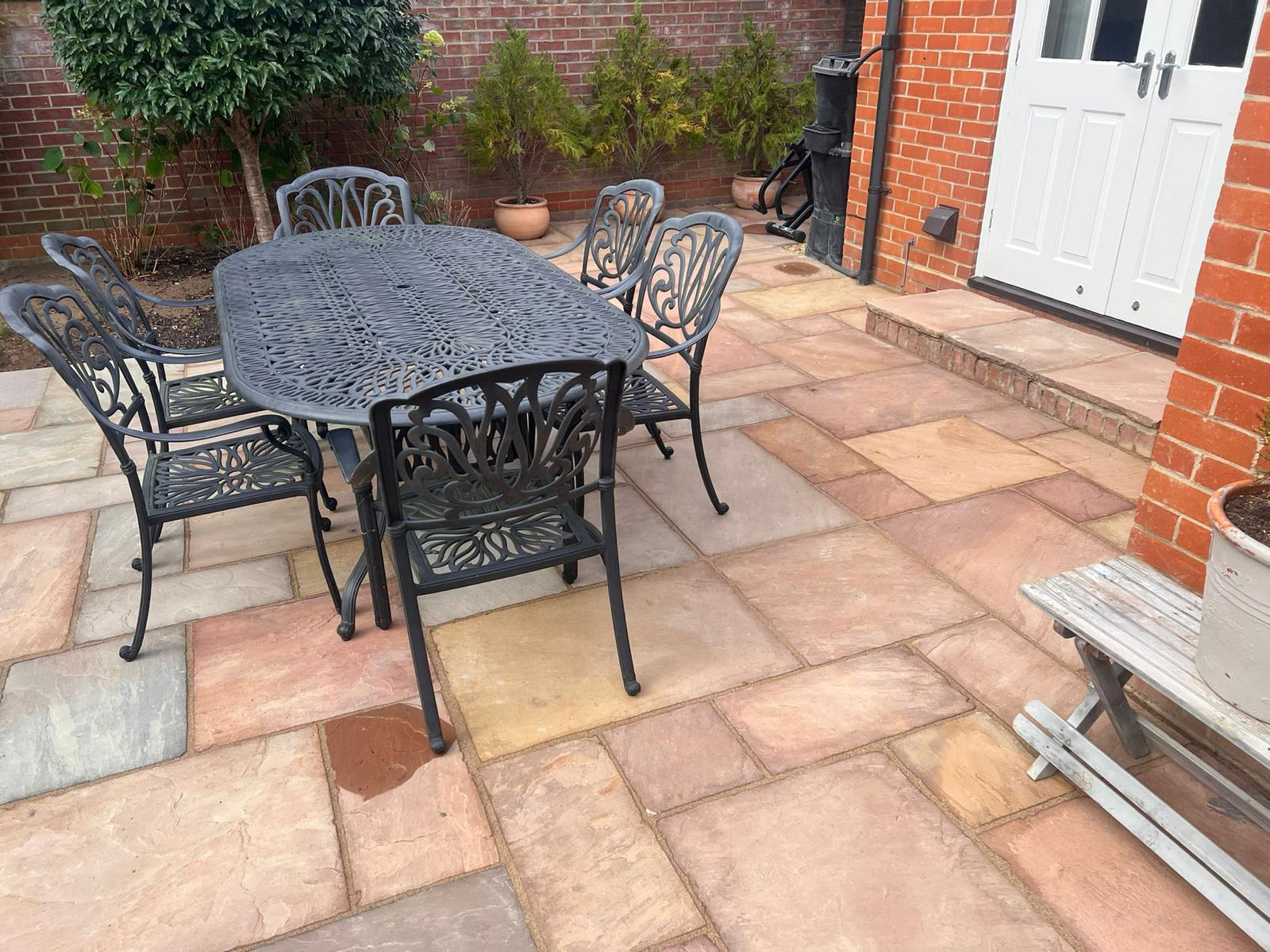 pretty patio with table and chairs for outdoor dining and crafting