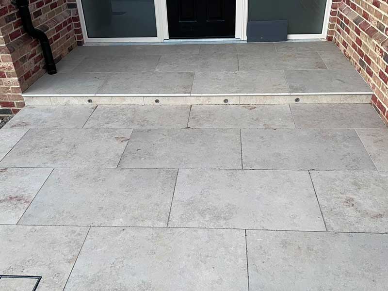 porcelain paving doorstep with recessed lighting fitted to step riser